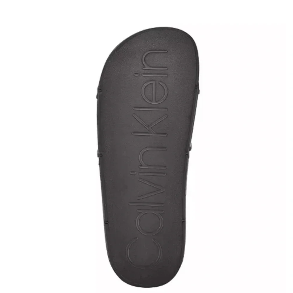 Calvin Klein Women's Austin Translucent Jelly Logo Pool Slides.